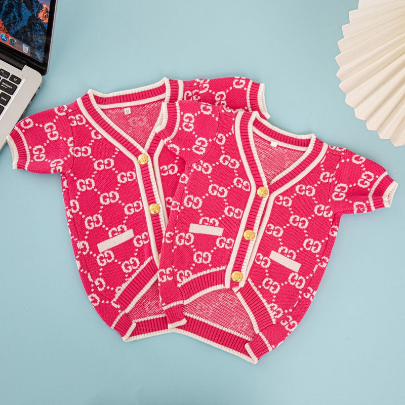 Cardigan con monogramma GG e rose, con bottoni dorati.