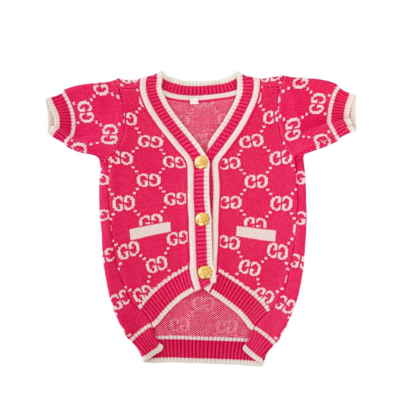 Cardigan con monogramma GG e rose, con bottoni dorati.